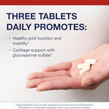 Tablettes Metagenics Glucosamine Sulfate, gros plan sur la texture, prise quotidienne possible.