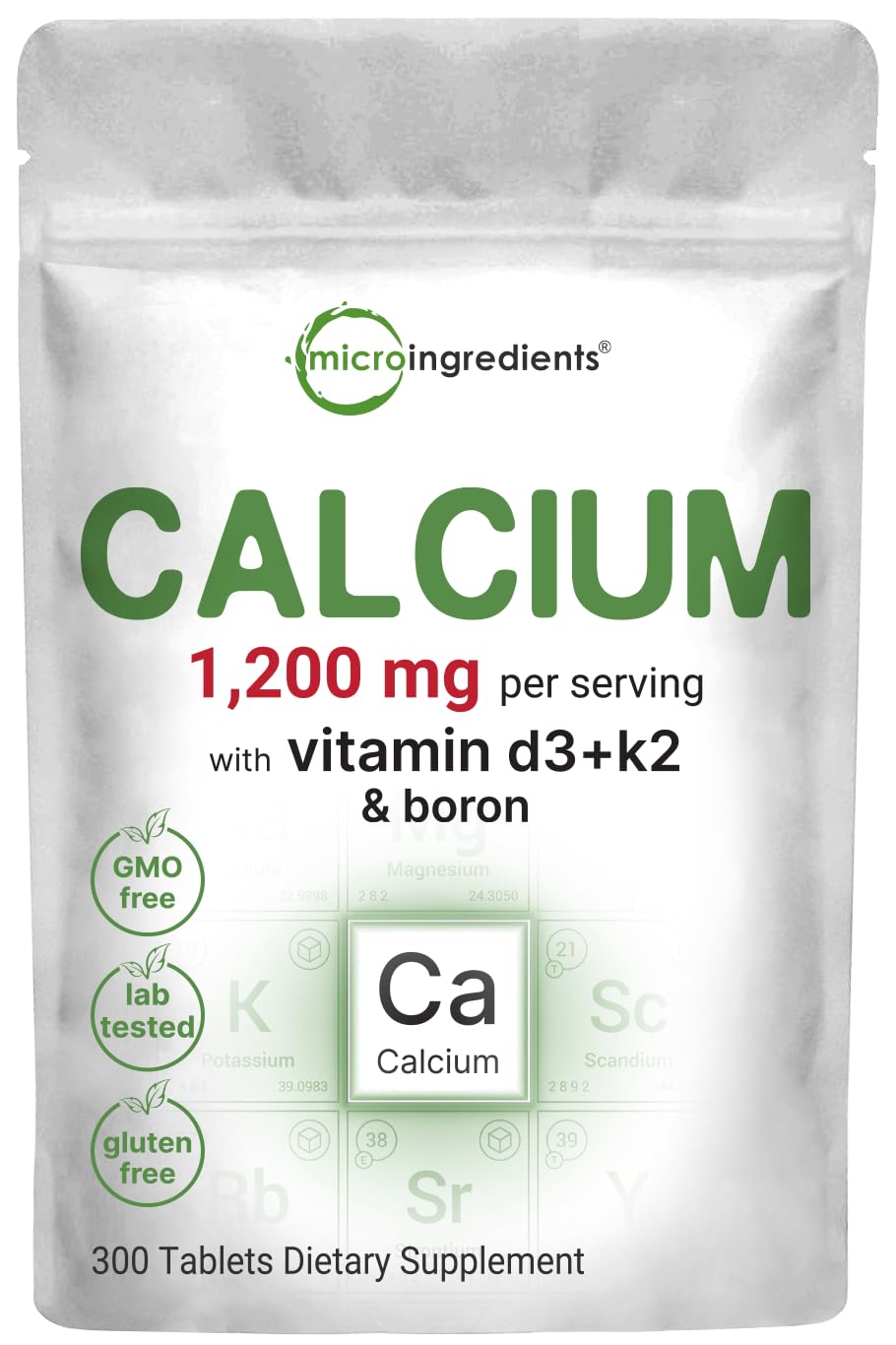 Micro Ingredients Calcium 1200 mg D3 K2, comprimé enrobé bisecté, surface lisse.