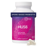 Microbiome Labs HU58, bouteille de probiotiques, favorise l'équilibre digestif.