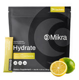 Mikra Hydrate sur table, pochette d'électrolytes pour hydratation rapide.