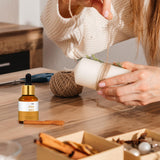Bouteille MitFlor Citrus Amber protégée UV préserve l’arôme riche.