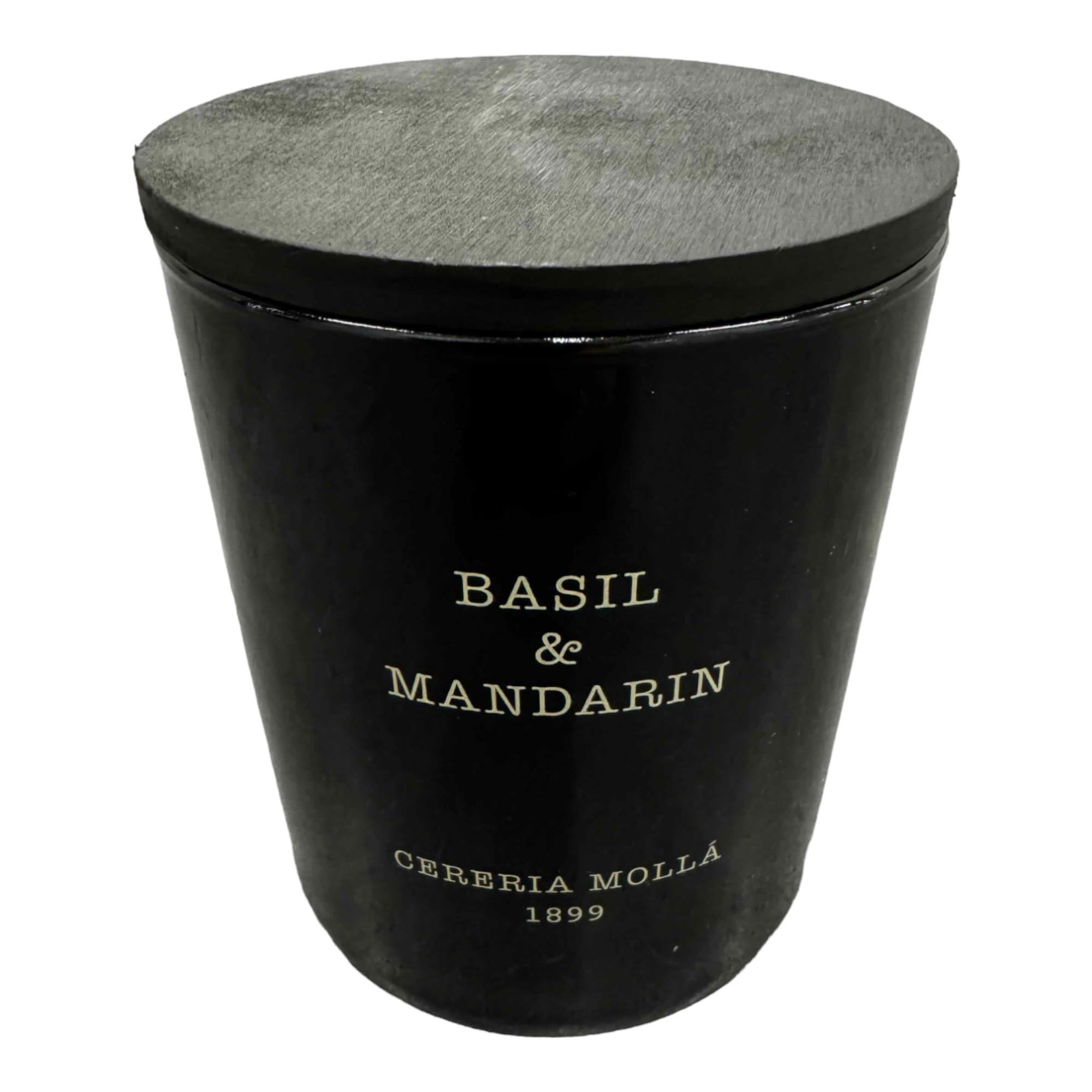 Molla 1899: bougie basilic et mandarine, parfum captivant pour une ambiance printanière.