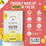 Maman enceinte appréciant les sucettes MommaBear pendant les nausées matinales.