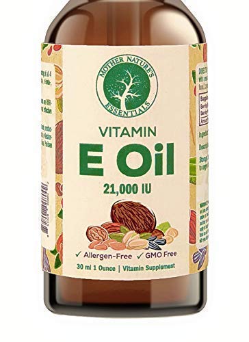 Flacon ambré de l'huile Vitamine E naturelle de Mother Nature's Essentials pour soins quotidiens.