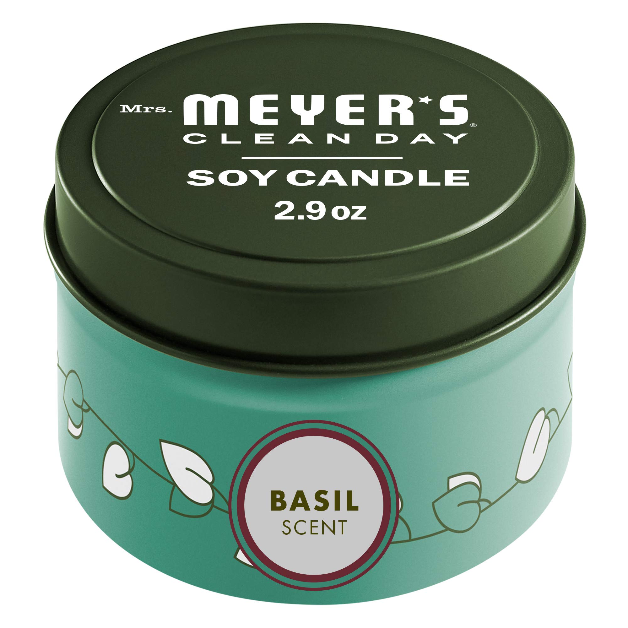 Bougie Basil de Mrs. Meyer's, boîte métal, crée une ambiance fraîche et naturelle.