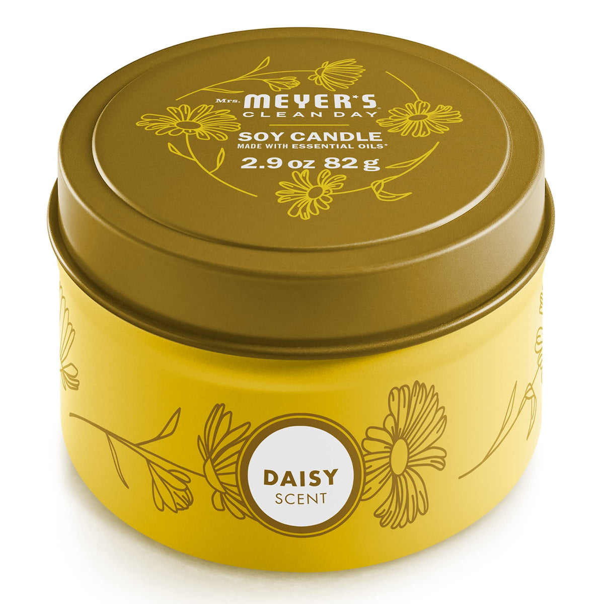 Bougie Daisy de Mrs. Meyer's dans une boîte métallique, ambiance florale.