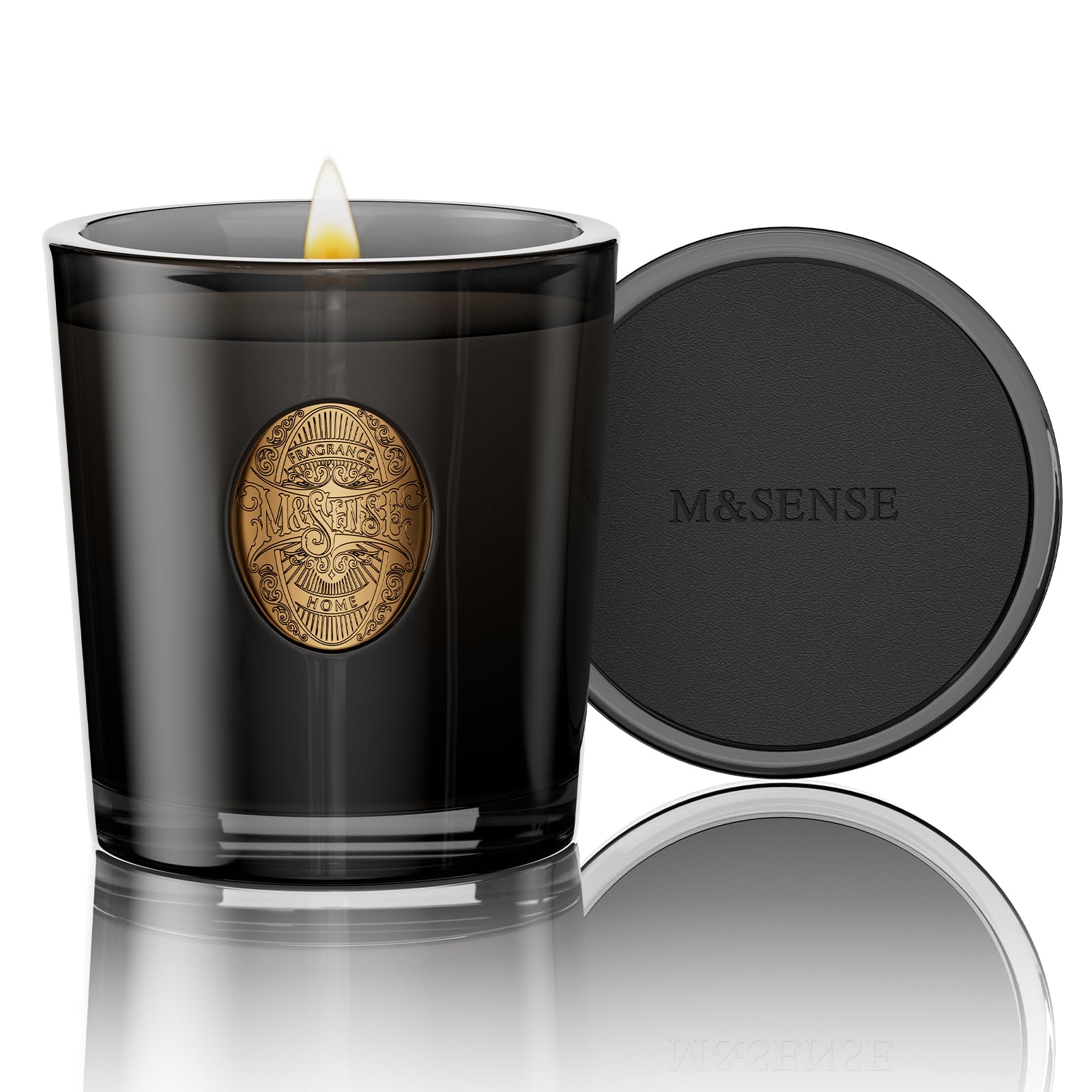 Bougie M&SENSE au soja Crisp Chill en verre noir, ambiance chaleureuse et élégante.