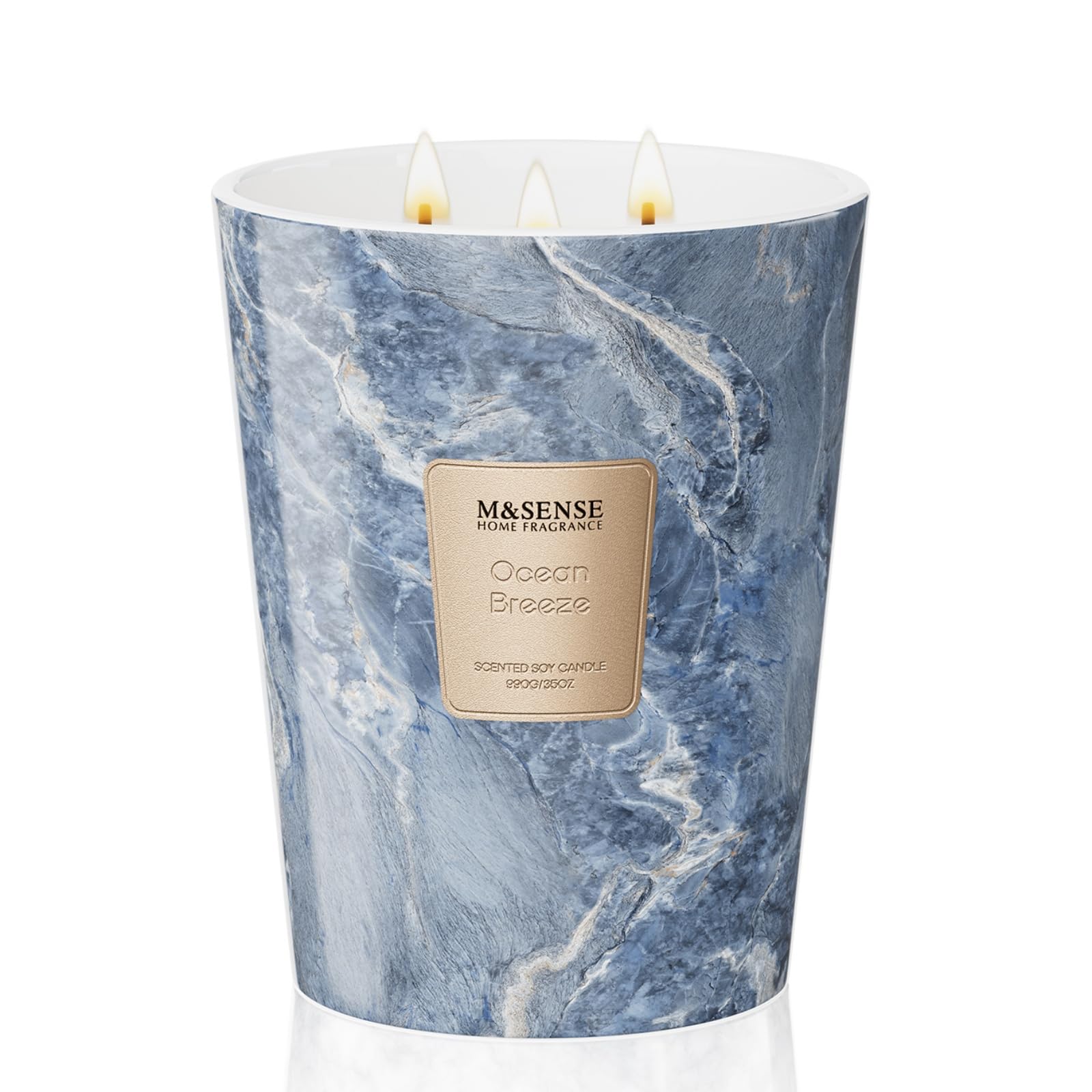 Bougie M&SENSE Ocean Breeze dans une jarre marbrée, ambiance premium et parfum durable