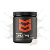 MTN OPS Créatine micronisée, cuillère-dose prête à être ajoutée à une boisson.