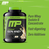 Cuillère-mesure MusclePharm Combat 100% Protéine vanille, dosage précis pour chaque portion.