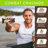 Barre MusclePharm Combat Sport chocolat gâteau, sans gluten, idéale après l'entraînement.