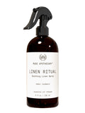 Muse Apothecary Linen Ritual – la bouteille Ambre-Cashmere prête à rafraîchir les draps.