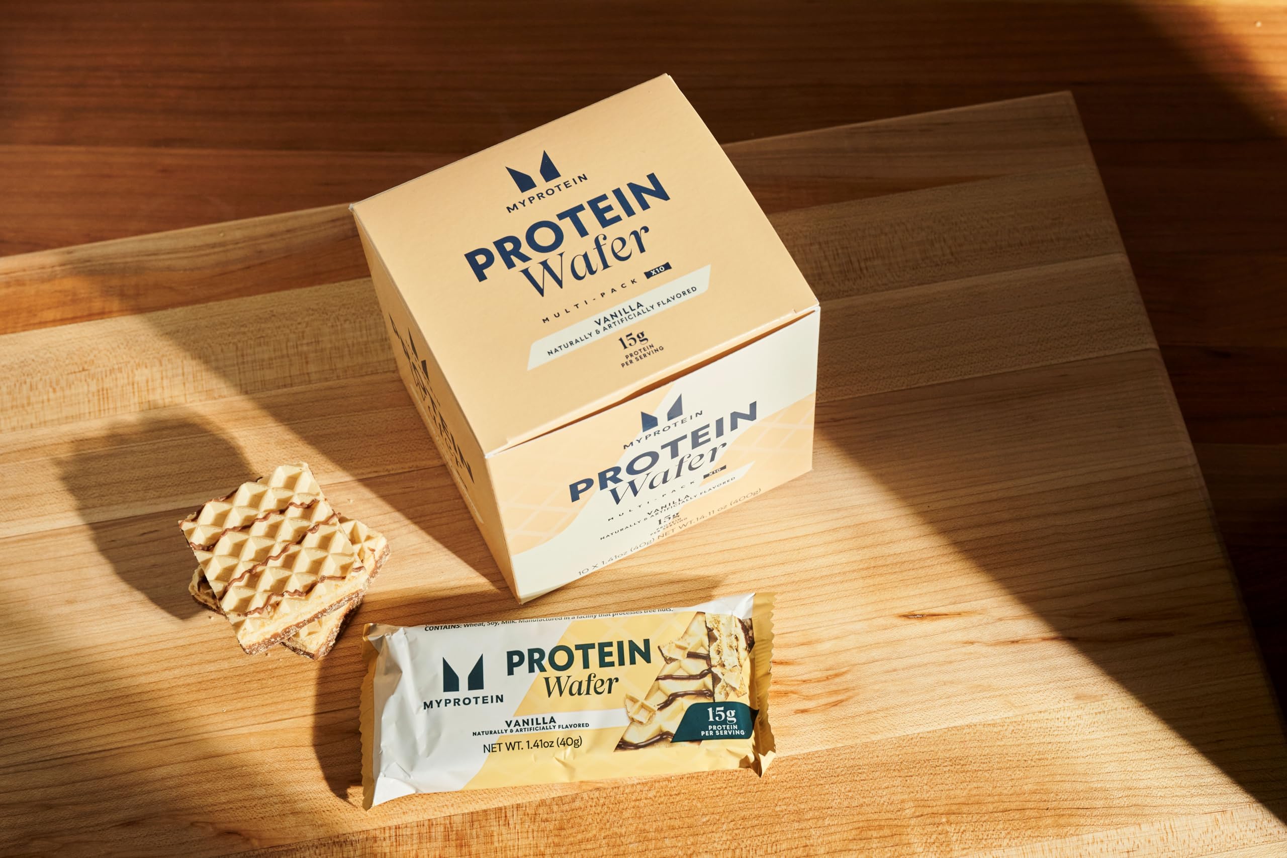 Barres protéine whey isolée Myprotein vanille intérieur, mélange lait et protéines de qualité.