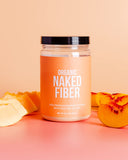 Verre contenant Naked Fiber, boisson quotidienne citronnée.