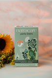 Natracare matériaux organiques en gros plan, douceur naturelle et respect de la peau.