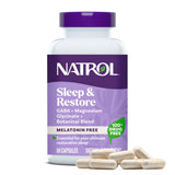 Natrol Sleep & Restore – bouteille sur table de nuit pour soutien au sommeil.