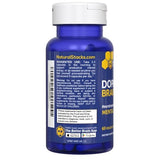Bouteille NATURAL STACKS Dopamine sur fond professionnel, rappel d’un rituel de travail.
