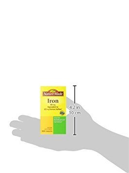 Nature Made Iron 65 mg, comprimé avec étiquette claire facilitant la prise quotidienne.