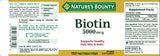 Biotine Nature's Bounty 5000 mcg, gelules molles empilées favorisant la santé des cheveux et de la peau.