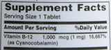 Nature's Bounty B12 1000 mcg – prise avec un verre d’eau pour faciliter l’ingestion.