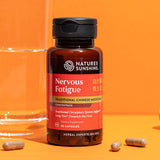 Bouteille Nature's Sunshine avec capsules d'herbes traditionnelles.