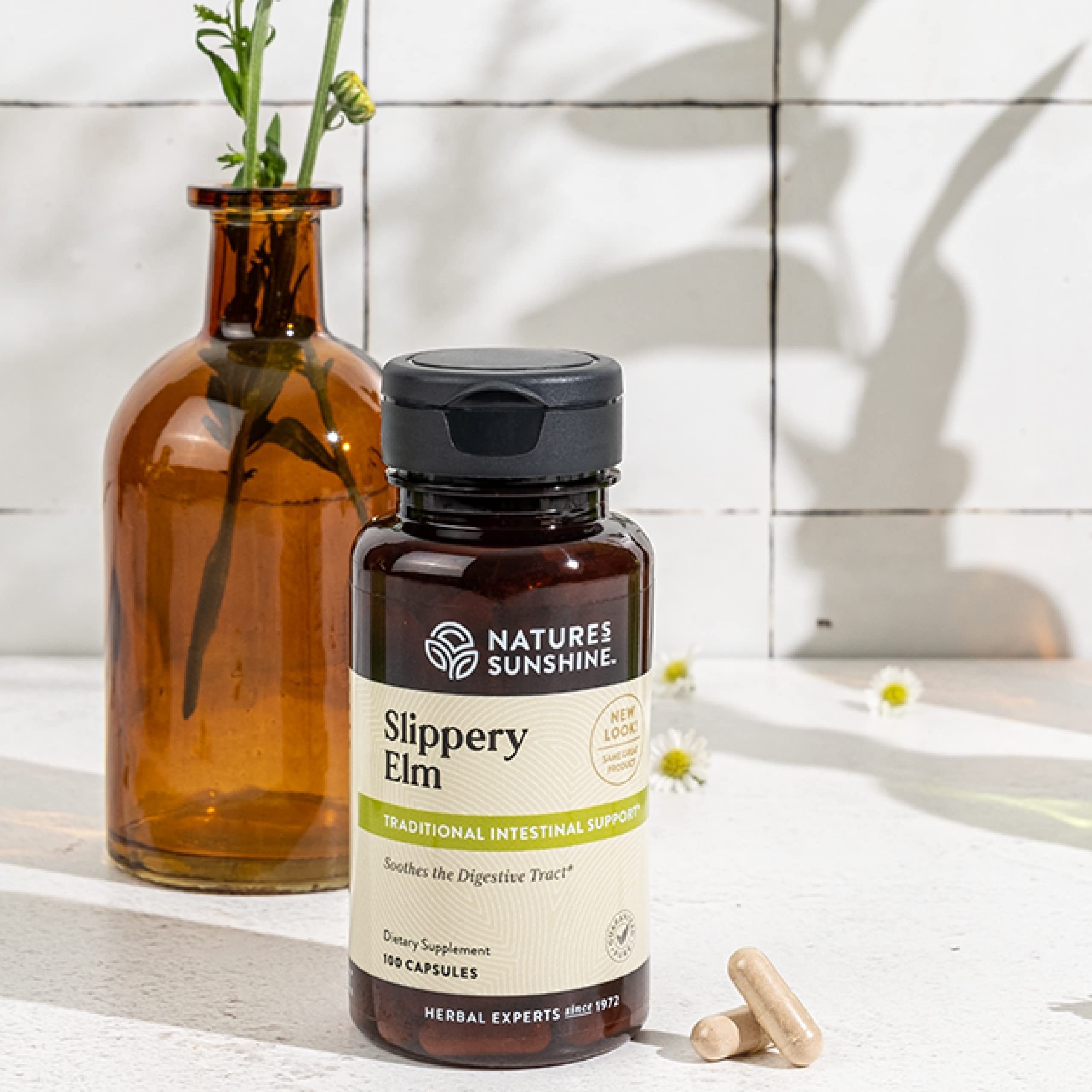 Nature's Sunshine Slippery Elm, étiquette recto, indication de qualité et ingrédients naturels.