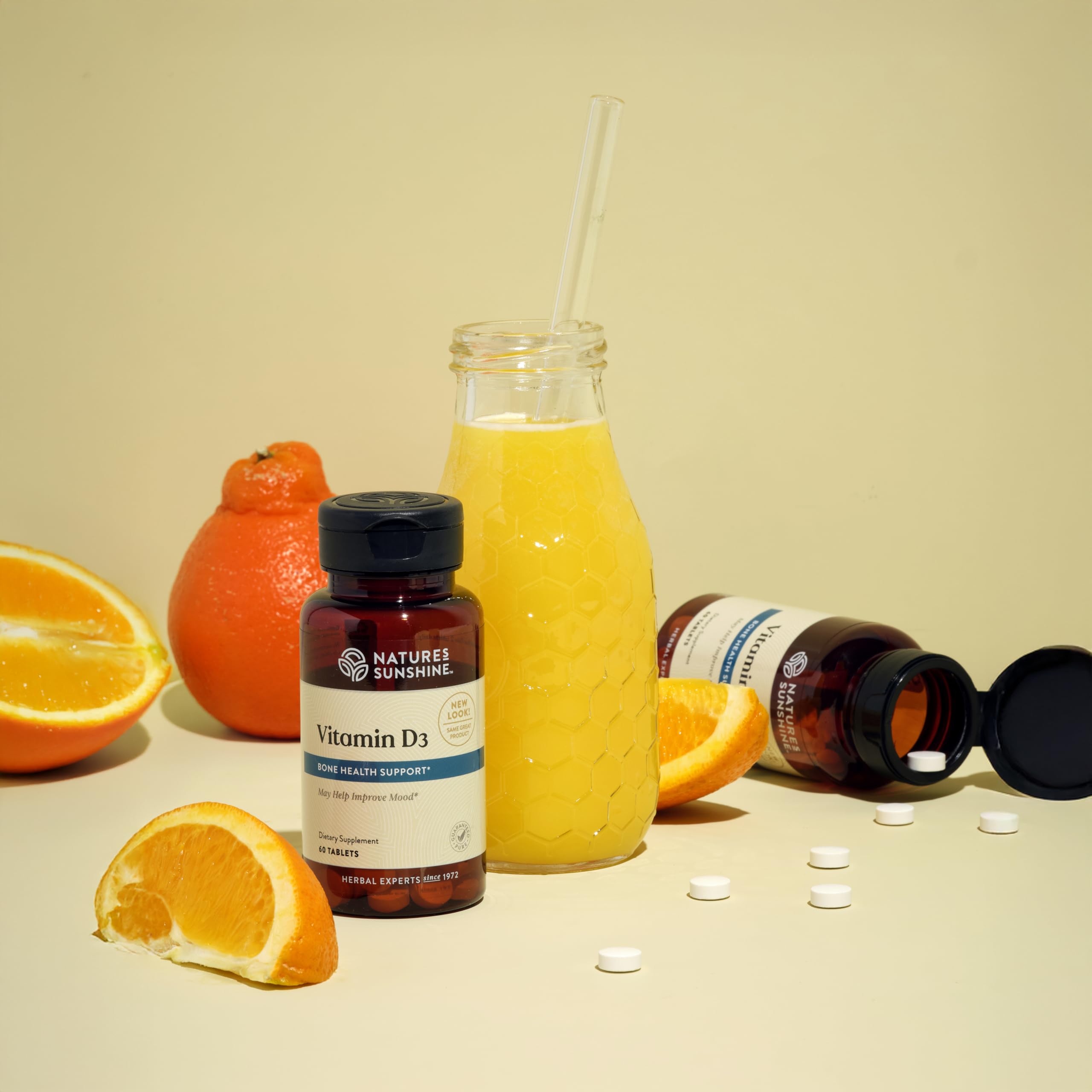 Tablettes Nature's Sunshine Vitamine D3 vues de près, dosage quotidien pratique.
