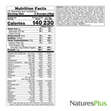 NaturesPlus Source de Vie Énergie vers un verre, dégustation prête.