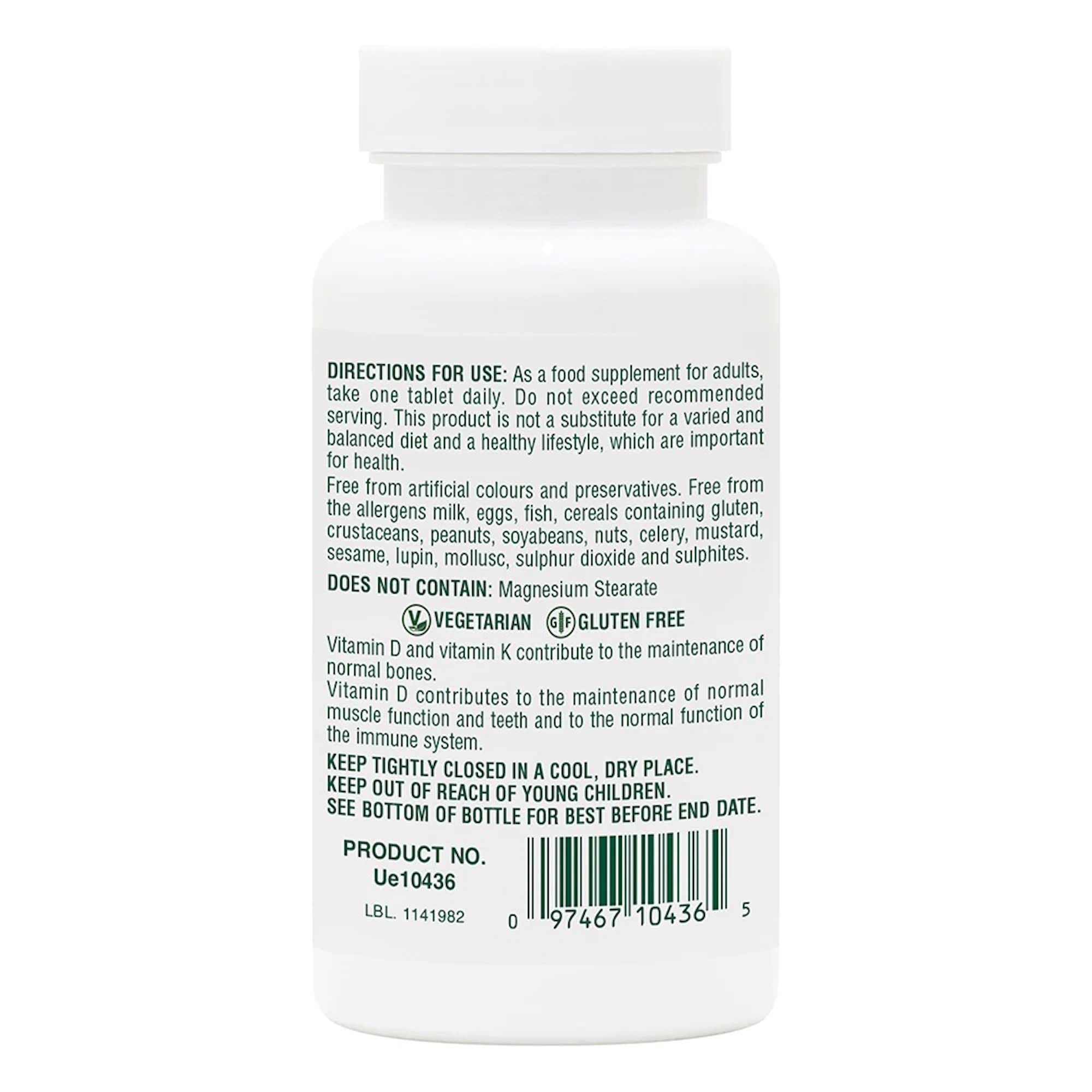 NaturesPlus D3 et K2 90 — comprimés alignés et visibles après ouverture de la bouteille.