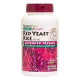 NaturesPlus Riz rouge de levure à libération prolongée dans une bouteille, pratique pour le quotidien.