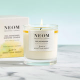 NEOM bougie, cire naturelle visible, flamme douce et durable