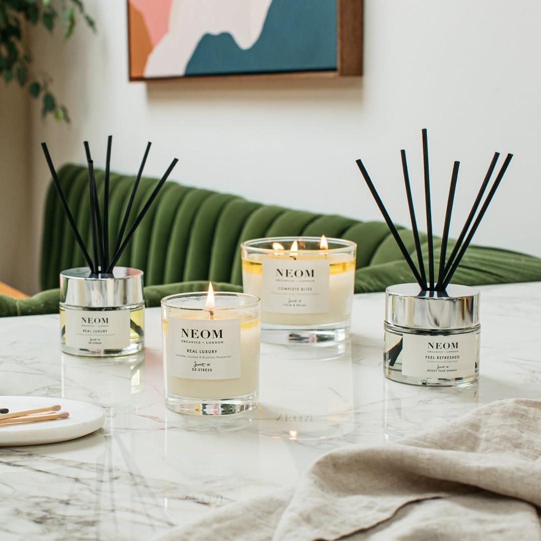 Neom Happiness 3 meches — diffusion uniforme et flamme stable.