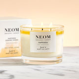 Neom Happiness neroli mimosa citron — parfum frais stimulant l'humeur.