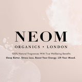 Petit flacon pratique pour les voyages avec Neom mélange huiles essentielles.