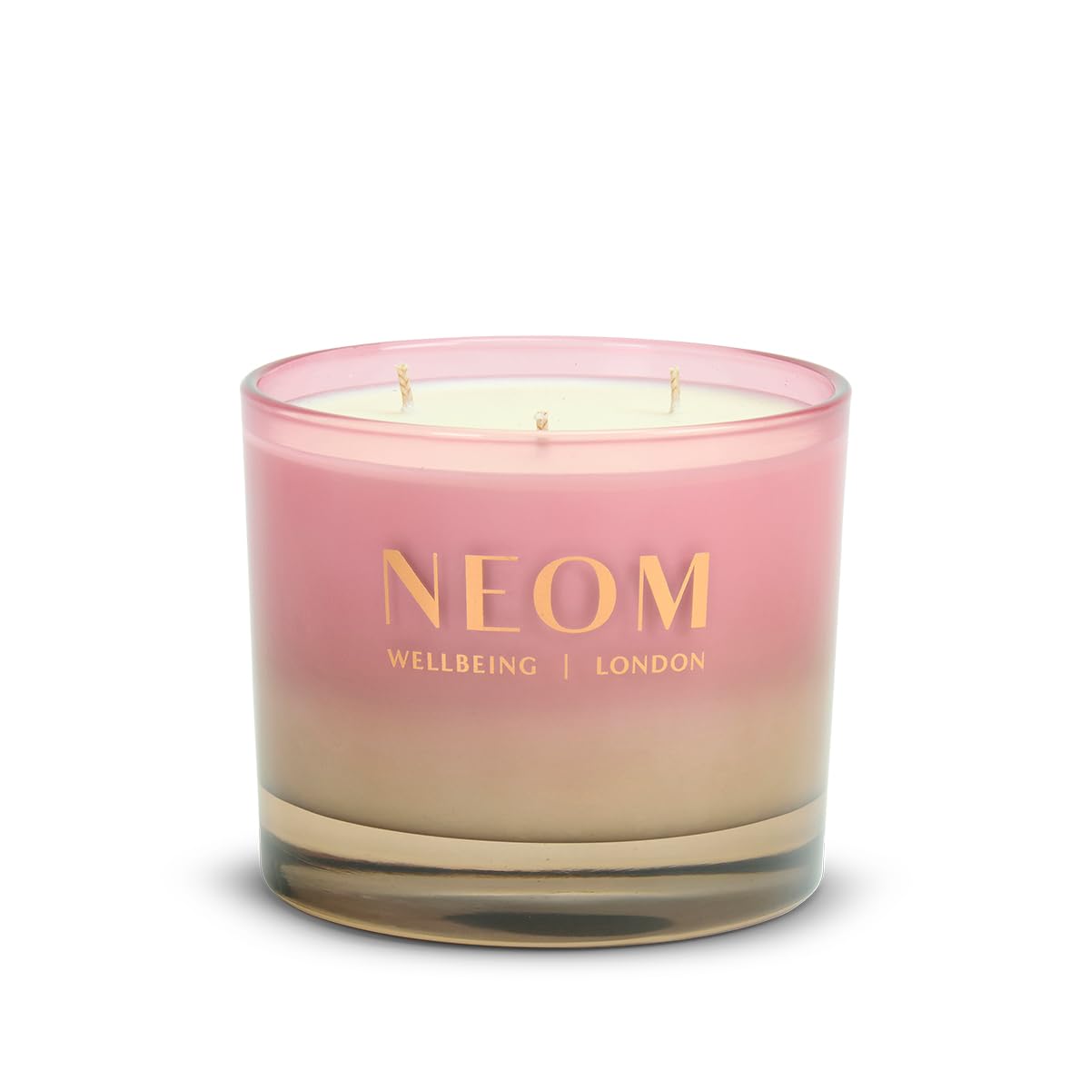 Bougie Neom Sparkling Joy avec 3-brins, diffusion homogène et constante.