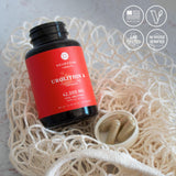 Premier plan des capsules Neurogan Urolithin A, texture lustrée et profil premium.