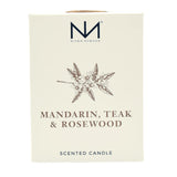 Flamme lumineuse et ambiance chaleureuse avec la bougie Mandarin Teck Rosewood.