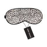 Masque NMM Global en soie de mûrier noir léopard, bloque la lumière pour des nuits plus calmes.