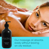 NOOKY huile massage coco — absorption rapide pour une peau douce après application.