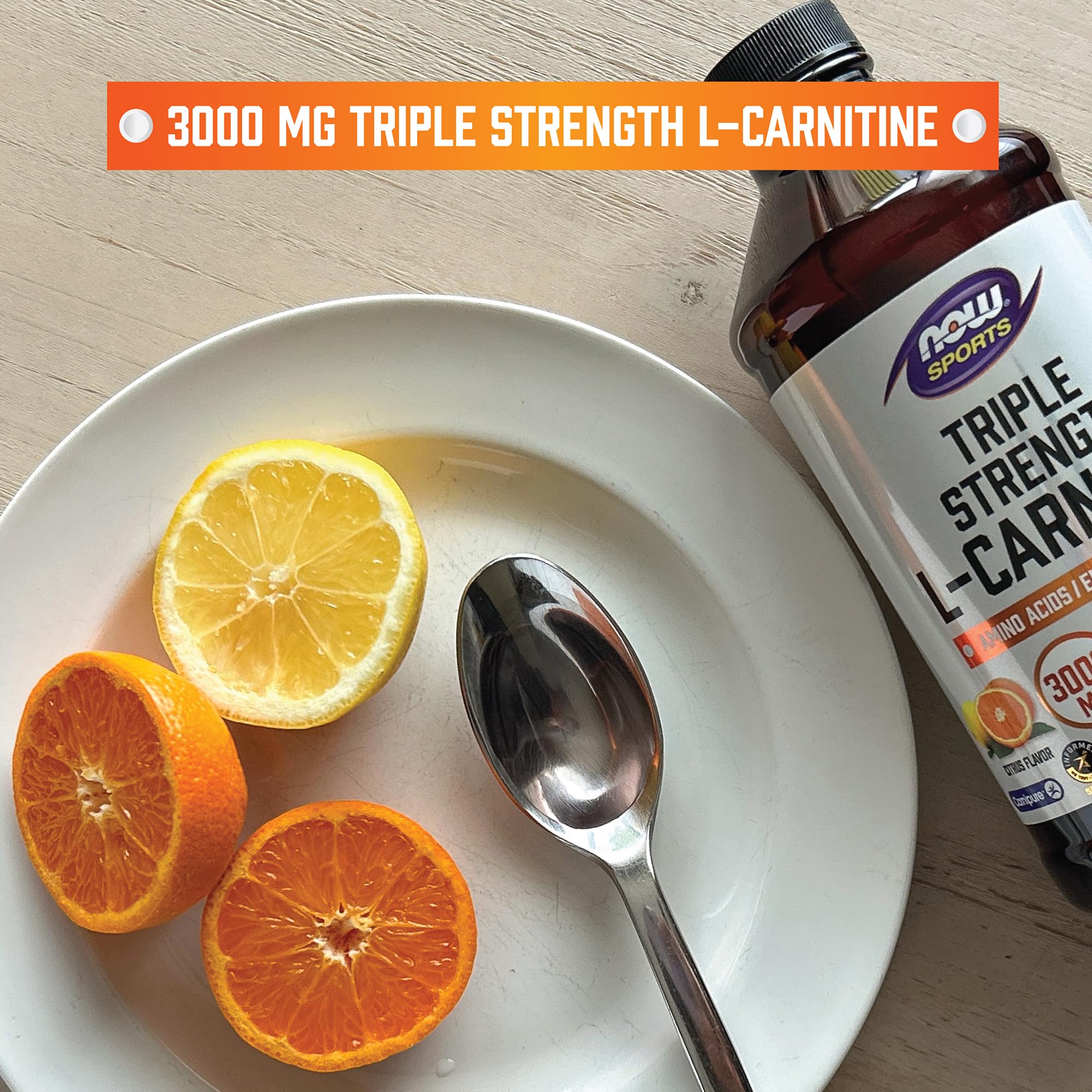 Mélange NOW Foods L-Carnitine Liquide citron dans un verre d’eau