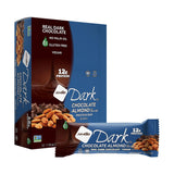 Barre NuGo chocolat noir amande sel mer, parfaite à emporter dans le sac.