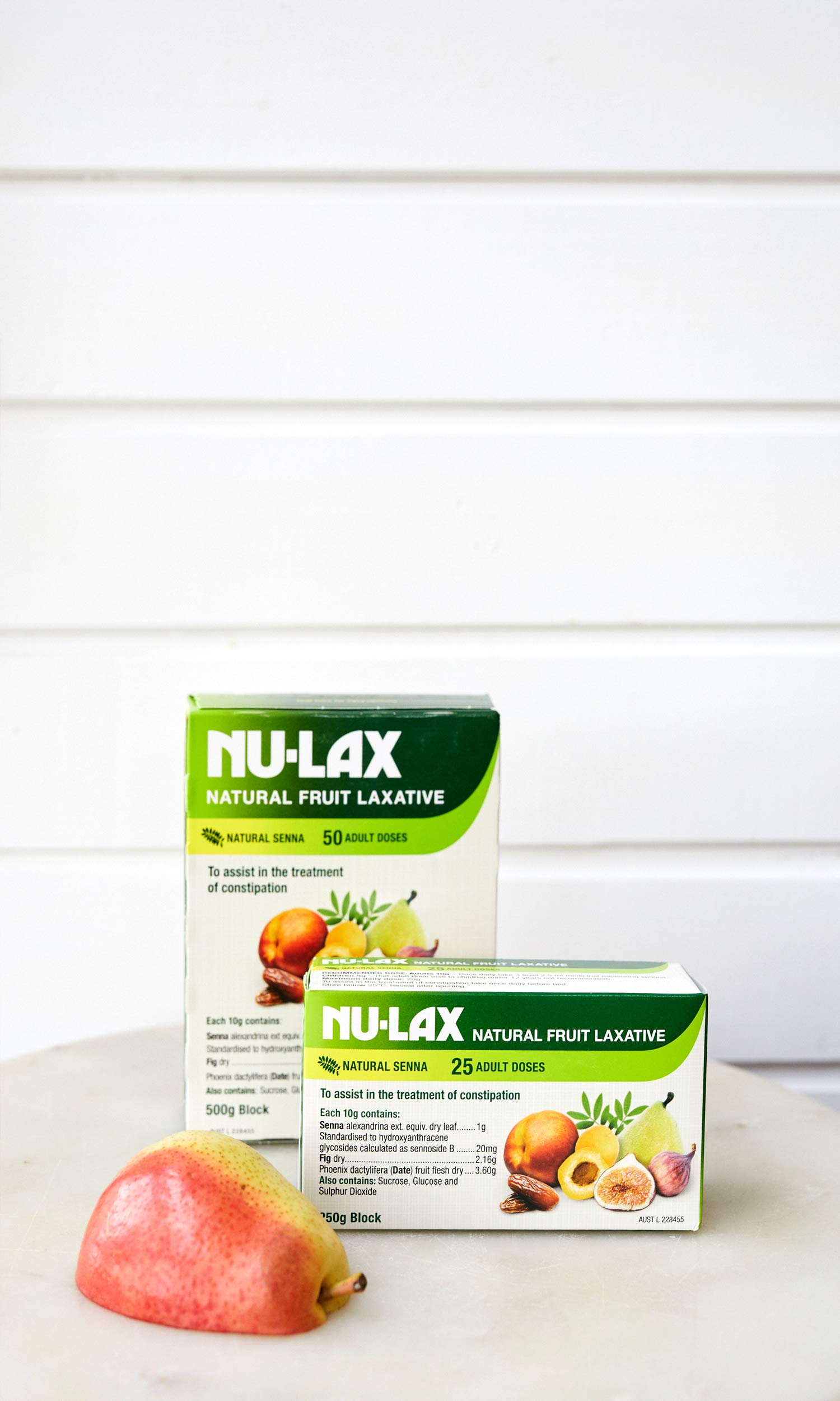 Nulax bloc laxatif fruits, à prendre avec un verre d’eau pour une action douce.