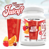 NutraBio Clear protéine whey Fruit Punch - verre d'eau avec la boisson prête