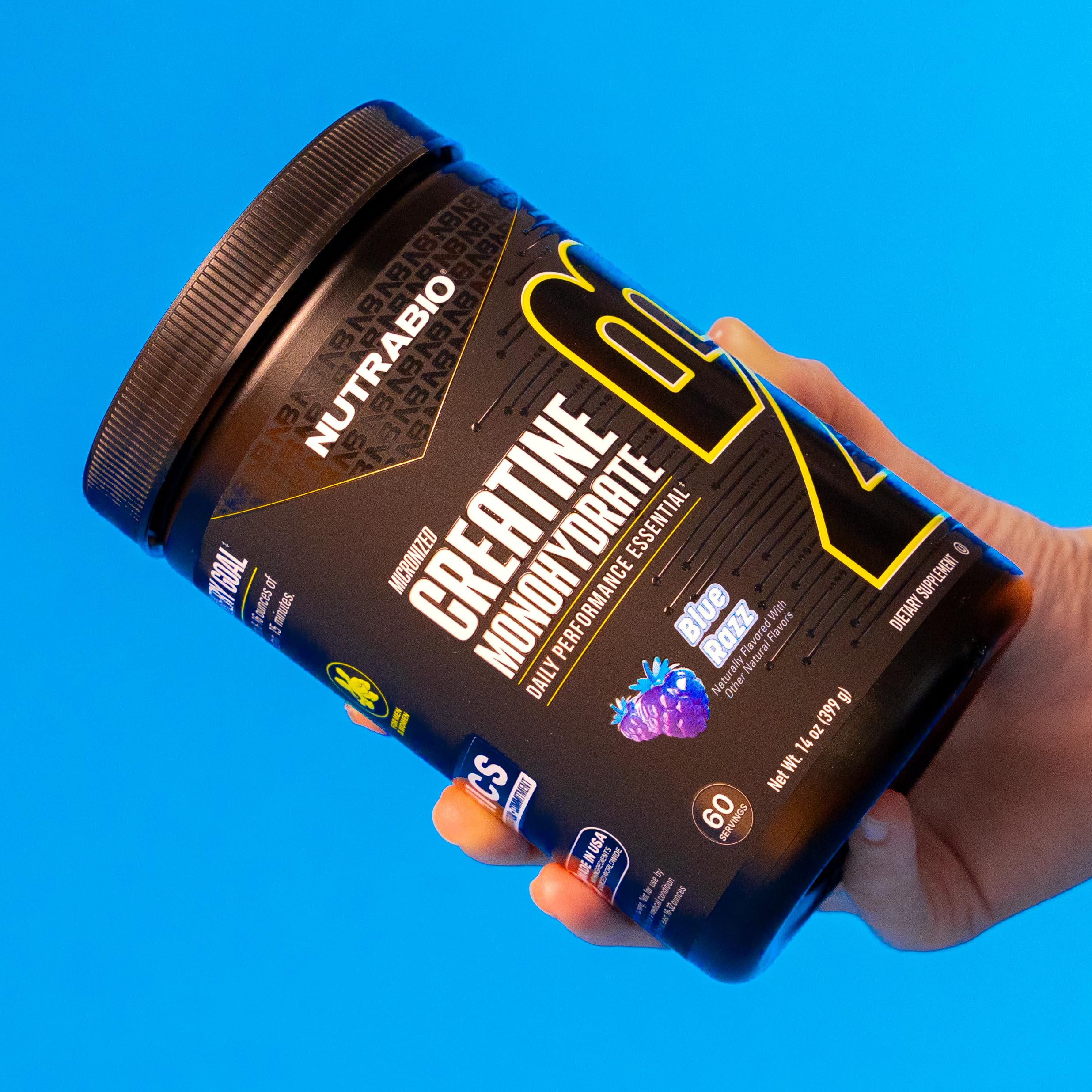NutraBio Créatine micronisée Framboise Bleue - athlète prêt à s’entraîner.