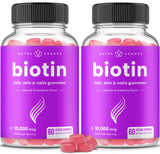 Gomme NutraChamps Biotine, bouteille ouverte, pratique à emporter pour cheveux sains.