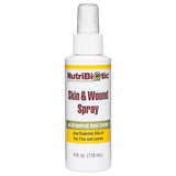 NutriBiotic Spray peau et plaies, bouteille-doseur, application sans contact.