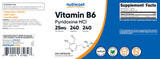 Nutricost B6 capsules, vue rapprochée des gélules en présentation claire