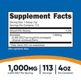 Nutricost Bromélaïne Poudre : flacon ouvert prêt à être dosé dans un smoothie.