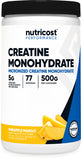 Nutricost Créatine Monohydrate Ananas Mangue - poudre micronisée prête au mélange avant l'entraînement.