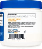 Nutricost L-Tyrosine Poudre – verre d'eau pour démarrer une routine.